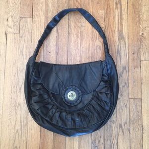 BCBG real lambs leather bag